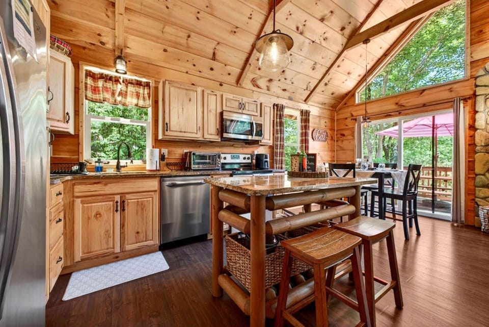 Cook, dine, and connect in the heart of the cabin's bright, open living space.