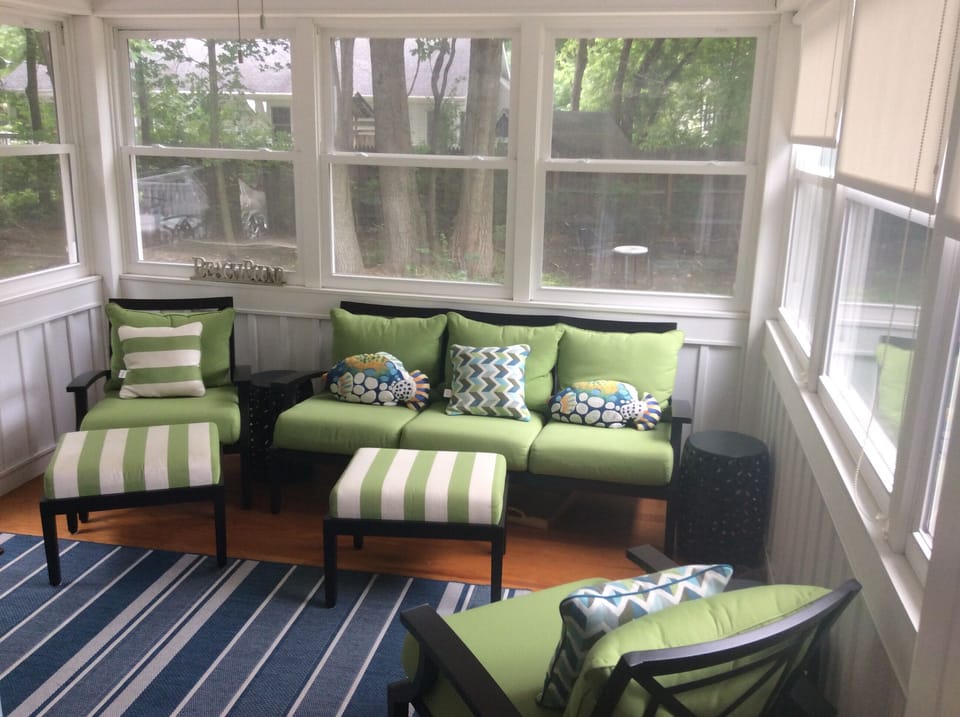 Fabulous rear enclosed porch with the new furniture!