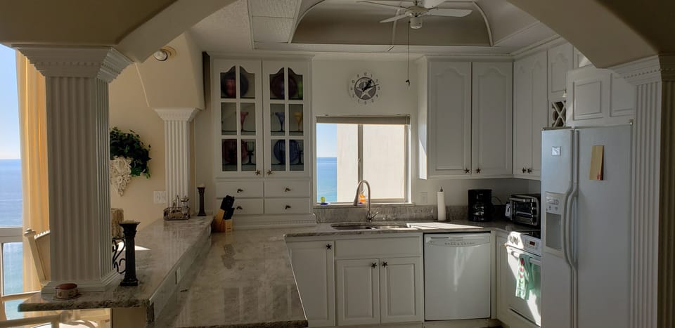 Fully stocked Kitchen with granite countertops