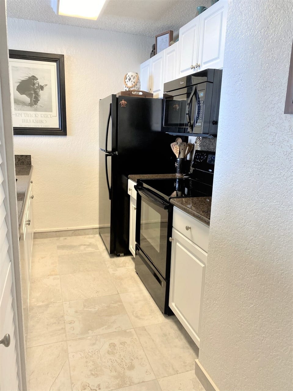 New tile has been added too along with a new dishwasher.