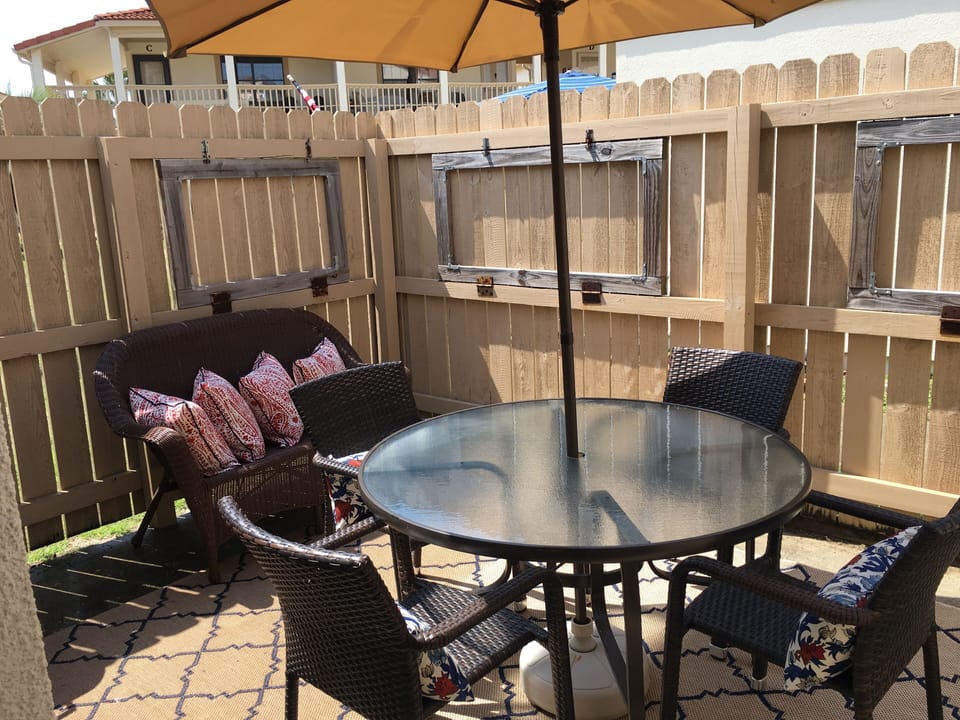 Private patio with new Weber Original Kettle 22" charcoal grill