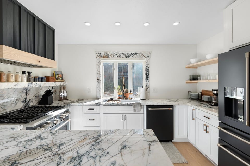 Kitchen modern appliances, coffee maker, pots, pans, utensils & granite counters