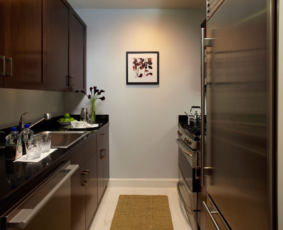 A full kitchen allows for in room dining experiences not common to luxury hotels