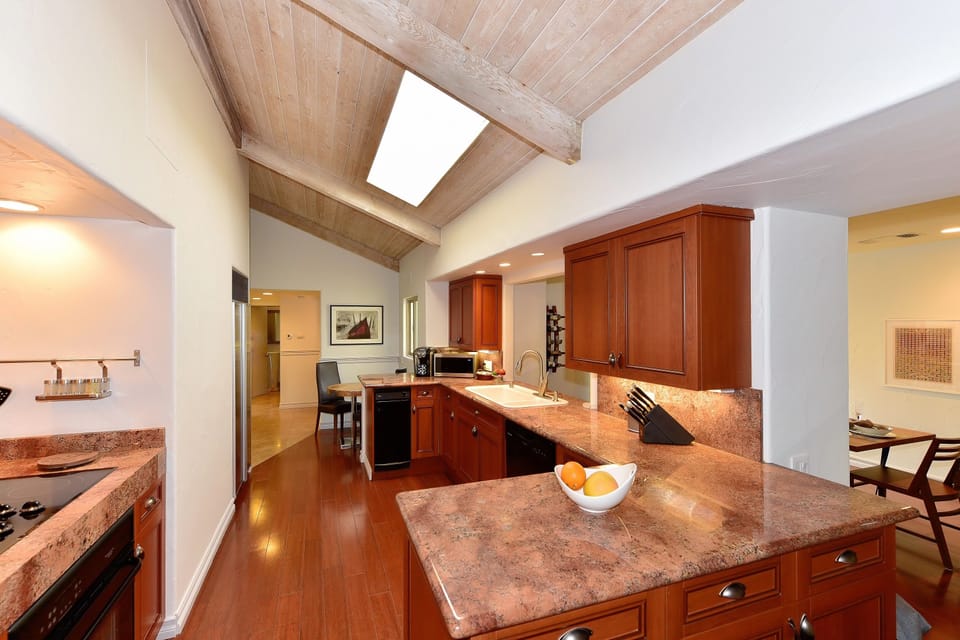 Skylight Provides Natural Light in Updated Kitchen