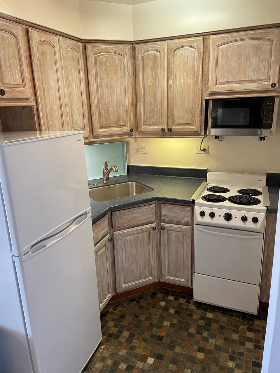 Kitchen area has all appliances needed for in house meals.