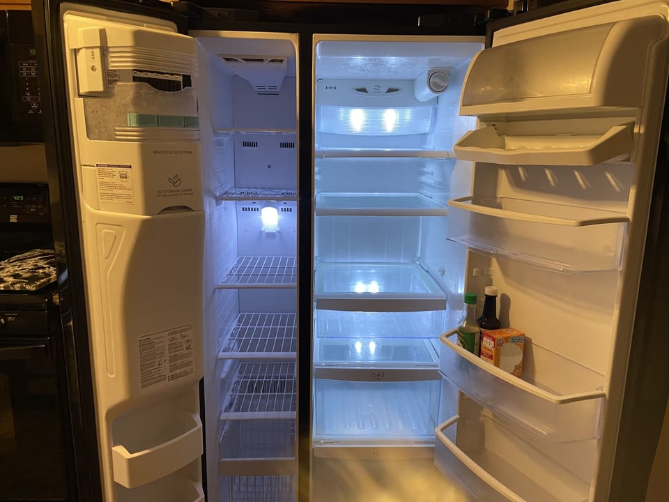 The refrigerator & freezer, the freezer has an automatic ice maker.