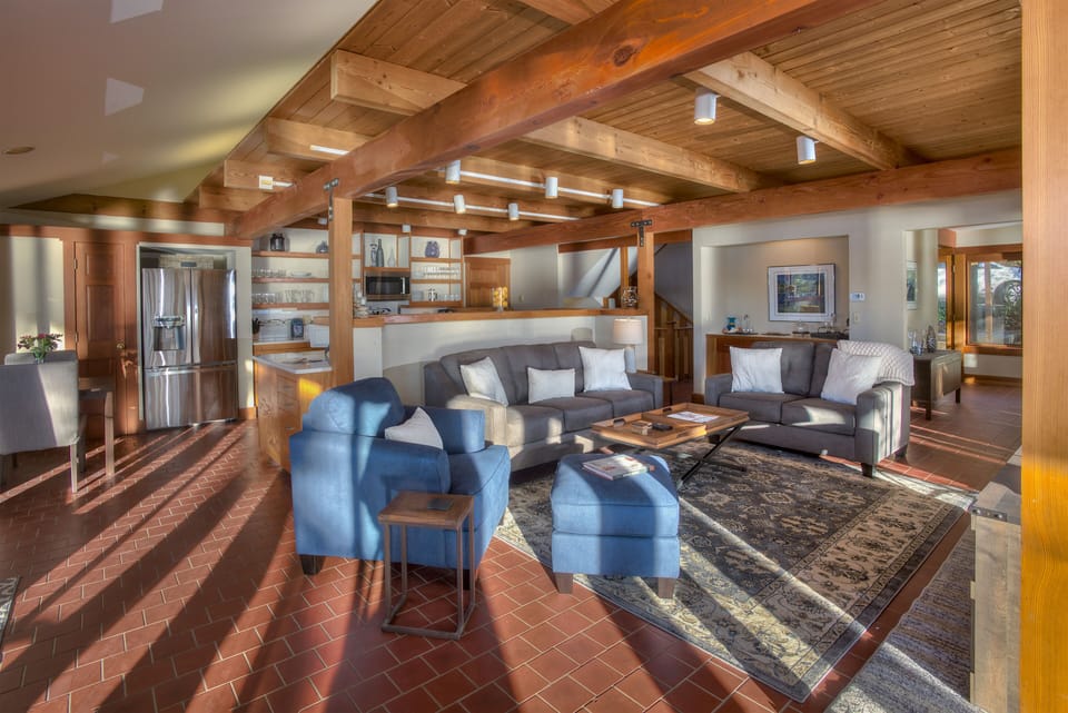 View of the living area kitchen and wet bar.