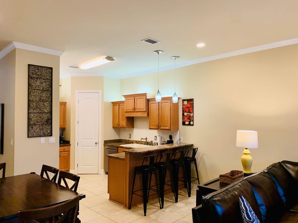 View of Kitchen.  4 counter stools 