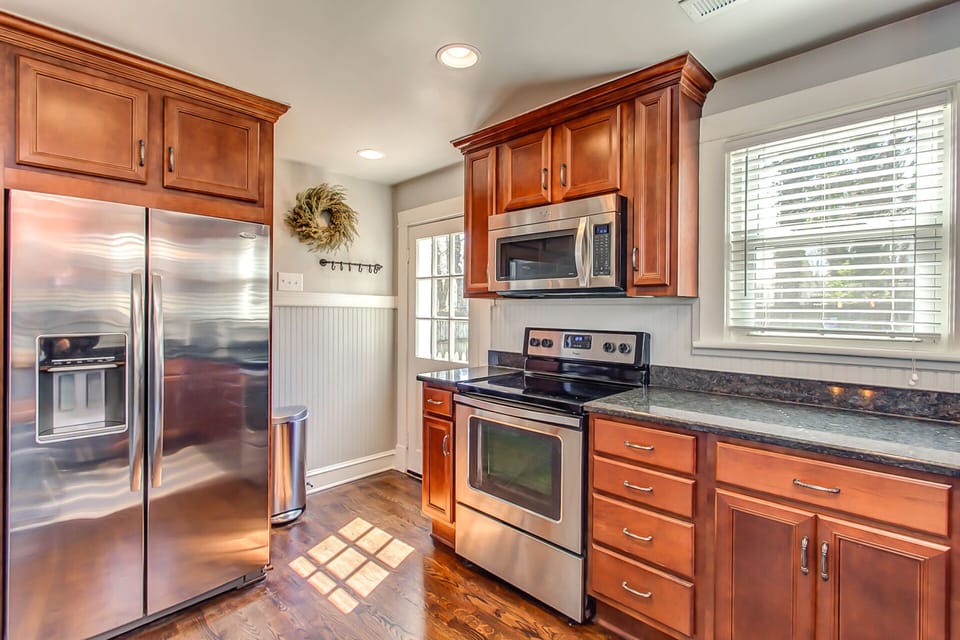 Bright kitchen! New stainless steel appliances!  Meal preparation a  snap!