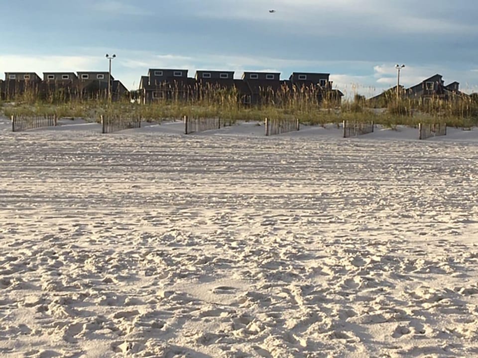 Condo is directly across from the protected white sand beach. Paradise!