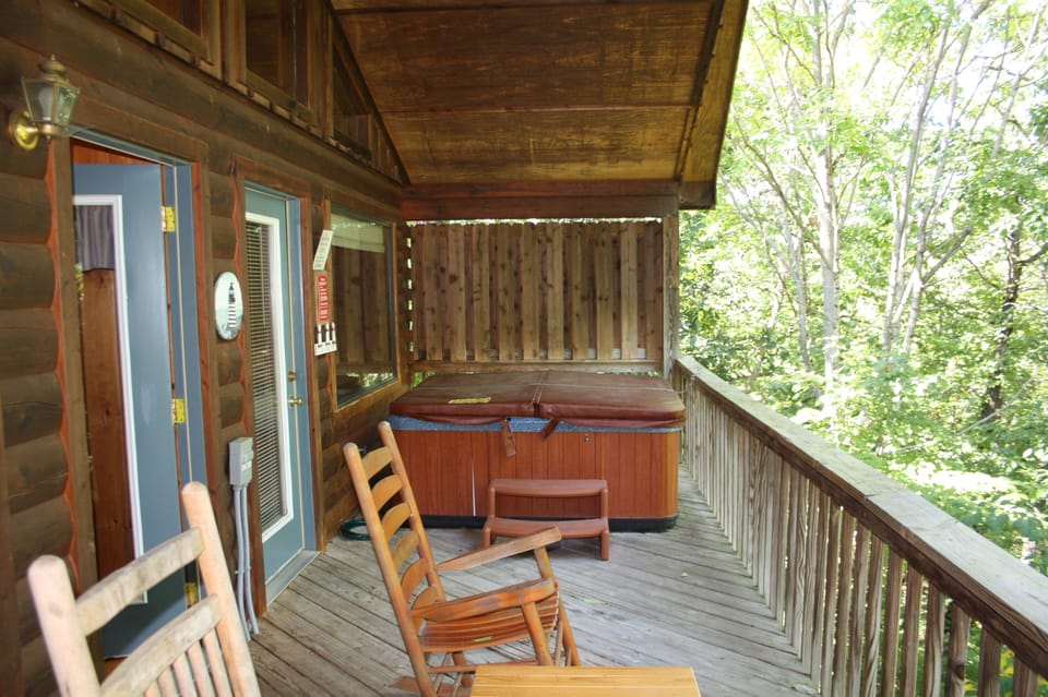 Spacious Porch with views of foliage. 