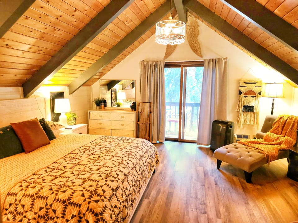 Upstairs primary bedroom, king bed, private balcony with river view