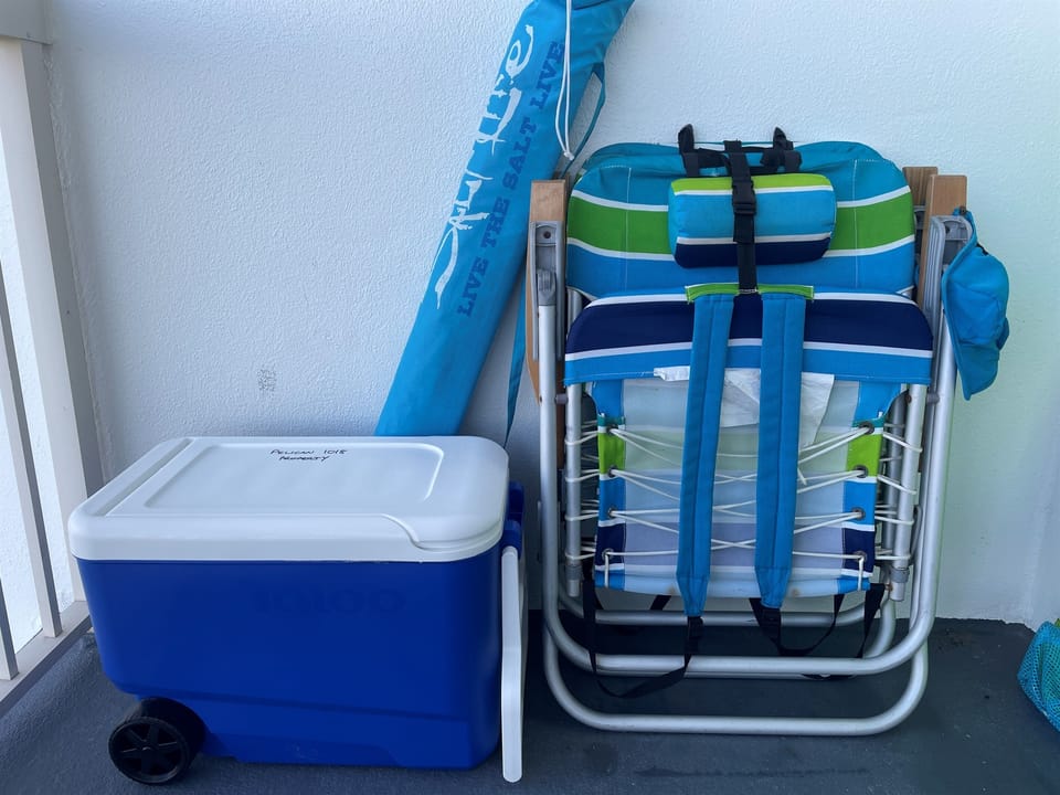 2 beach chairs, cooler, umbrella provided