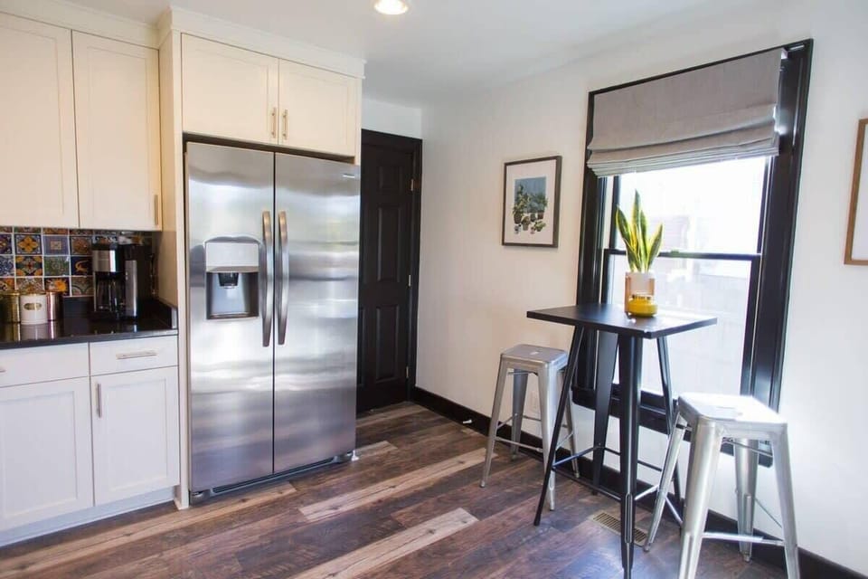Main House: Beautiful spacious kitchen, stocked with cookware essentials, coffee machine, and all stainless steel appliances.
