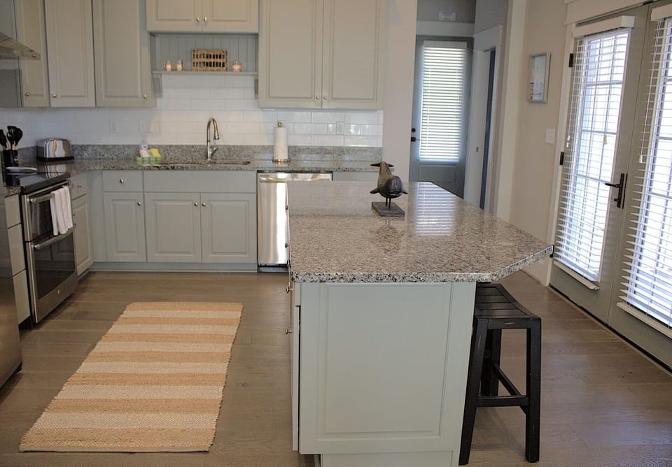 A spacious island with seating, creating a sleek and functional space great for cooking and entertaining. Our kitchens are the hub of it all.