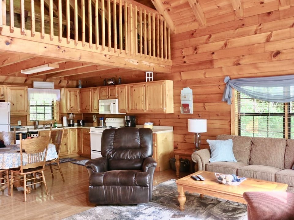 Open concept cabin makes for a welcoming, cozy feel