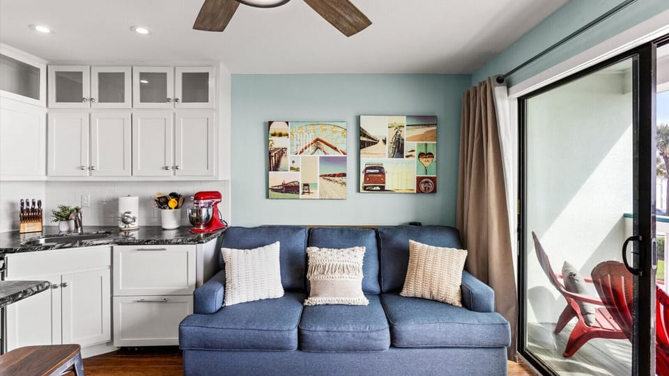 Stretch out in the living room, then pull the sofa into a queen sleeper—great for family-friendly trips and Galveston Island event weekends.