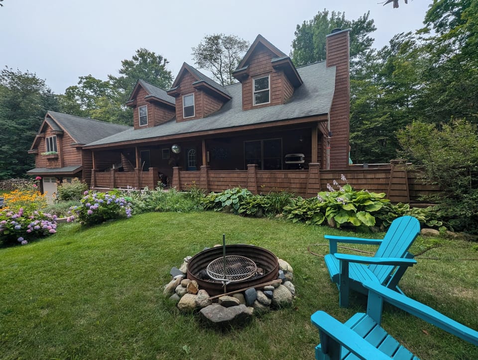 The apartment is above the garage to the left of our home.