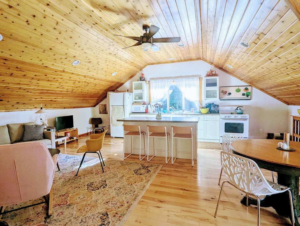 Lots of seating in the bright and sunny living space.