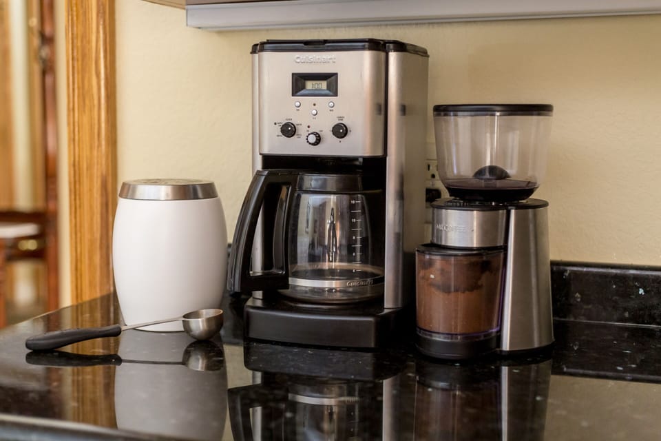 Coffee bar includes Whole bean coffee, Grinder, Cream and Sugar.