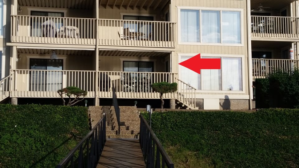 Walk-out patio right in front of boat dock.   Only 4 walk-outs in the complex!