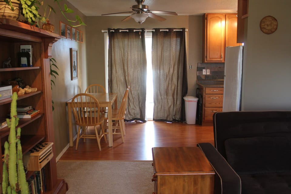 View of dining area and patio door.