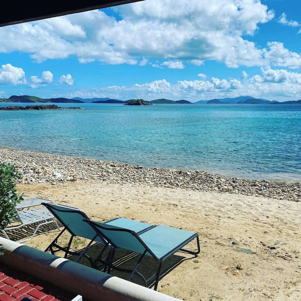 Lounge outside the patio doors. No need to drag them up to the beach