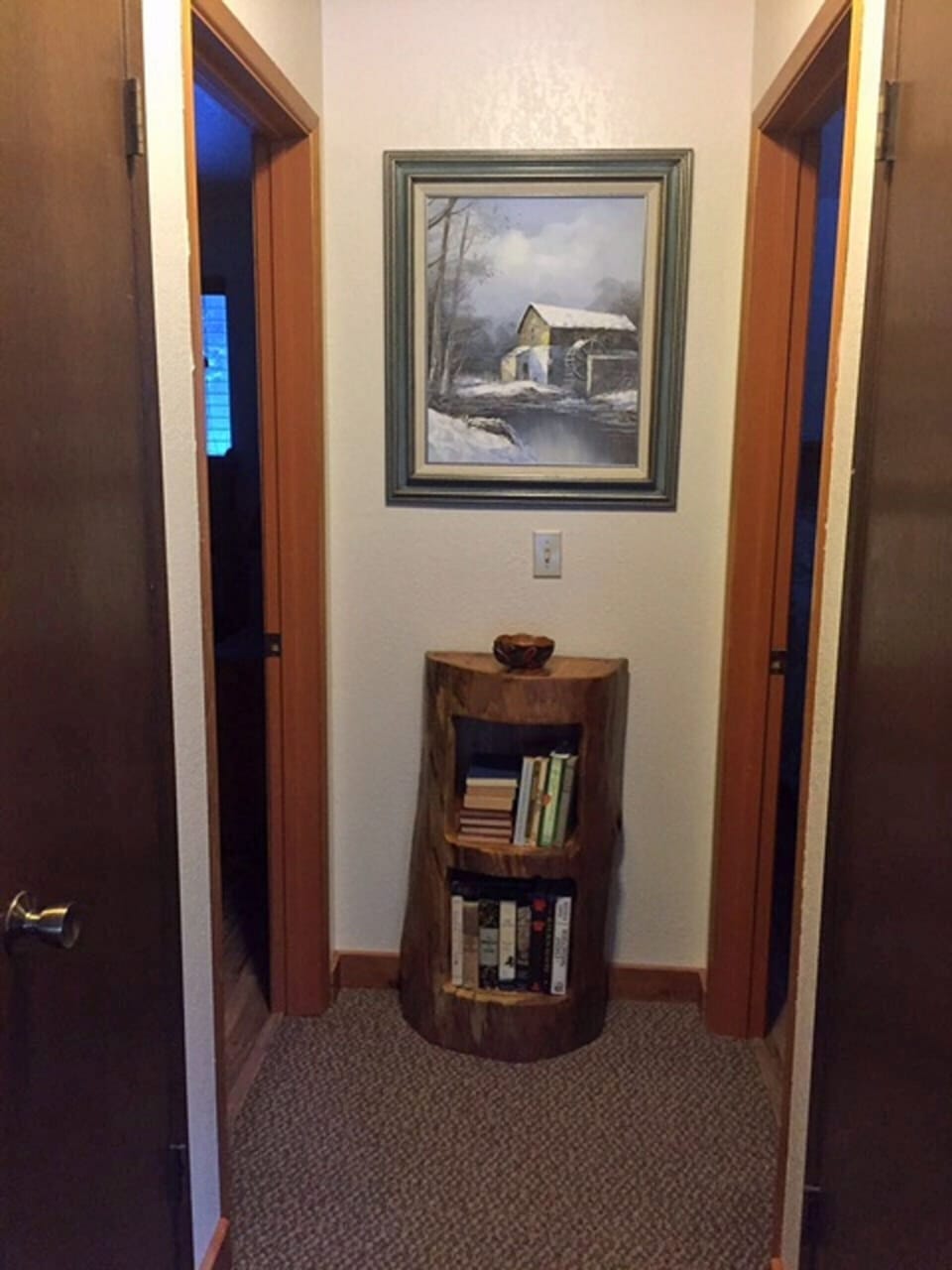 Hallway to your bedrooms, grab a bedside read as you wish