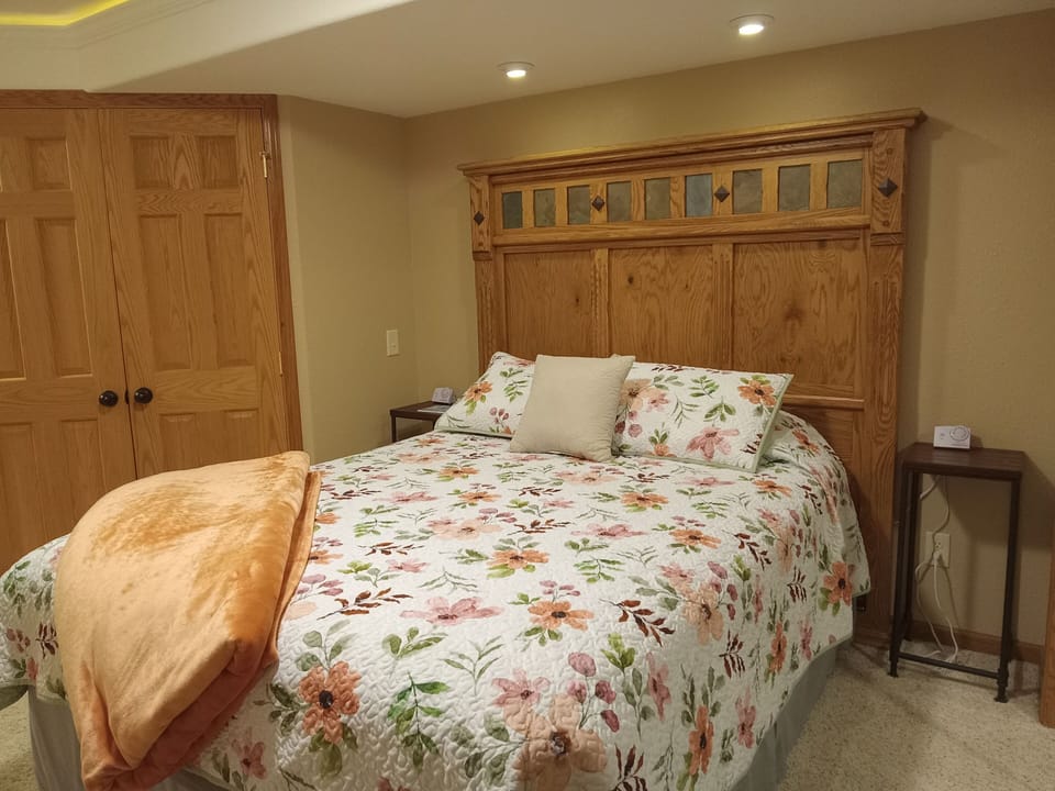 Lower level bedroom; queen sized bed