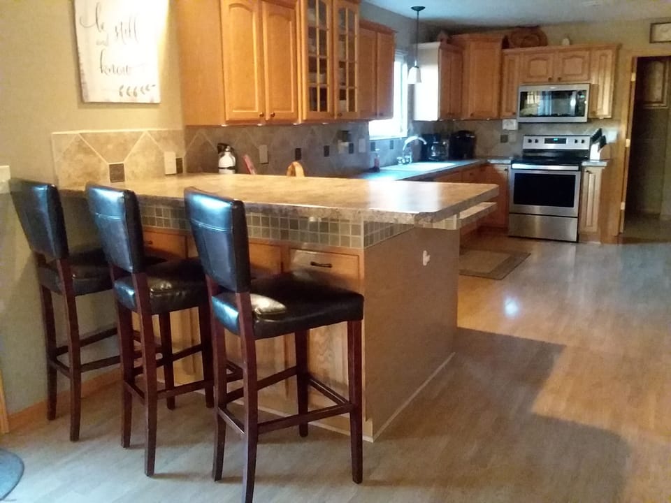 Main level; kitchen; bar seating
