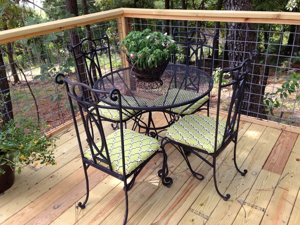 Deck table & chairs sit 4. Christmas lights can be plugged in all year long. 