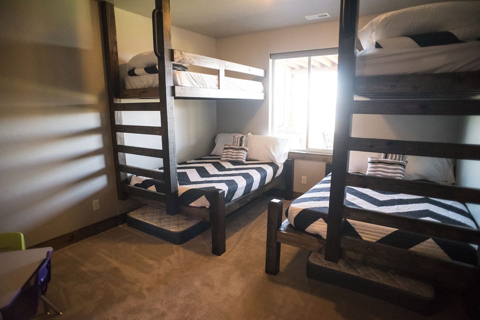 Bedroom 9 w/ 2 full and 4 singles plus 50" tv with dish and DVD