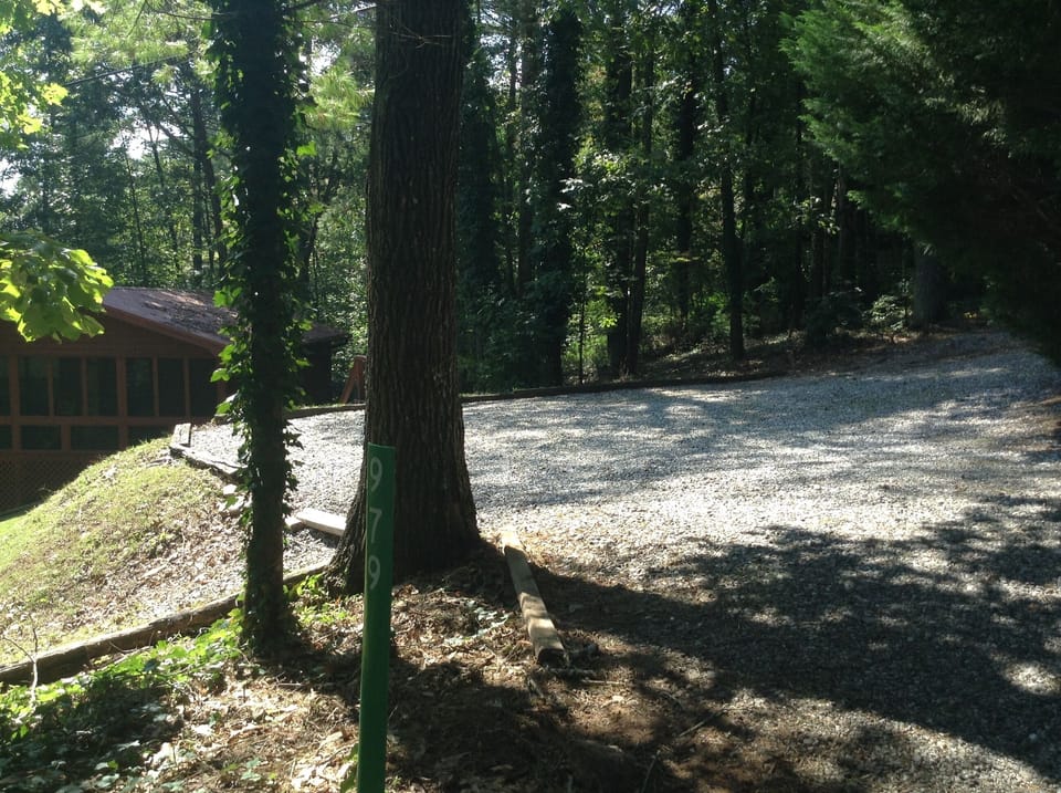 View from the road of the parking area without a vehicle
