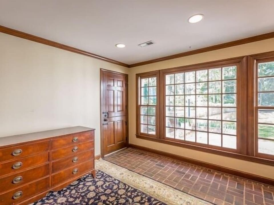 Pub/ game room. Goes out to screened in porch and outdoor patio 
