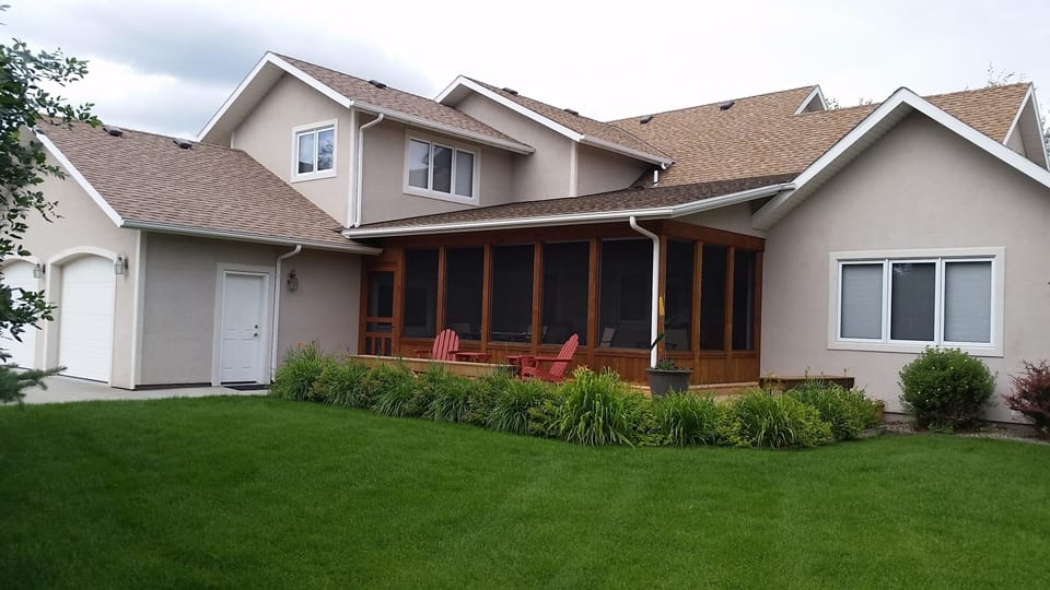 Large screened in porch for summer time enjoyment.