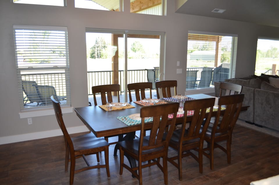 There are folding table and chairs in the garage for more seating.