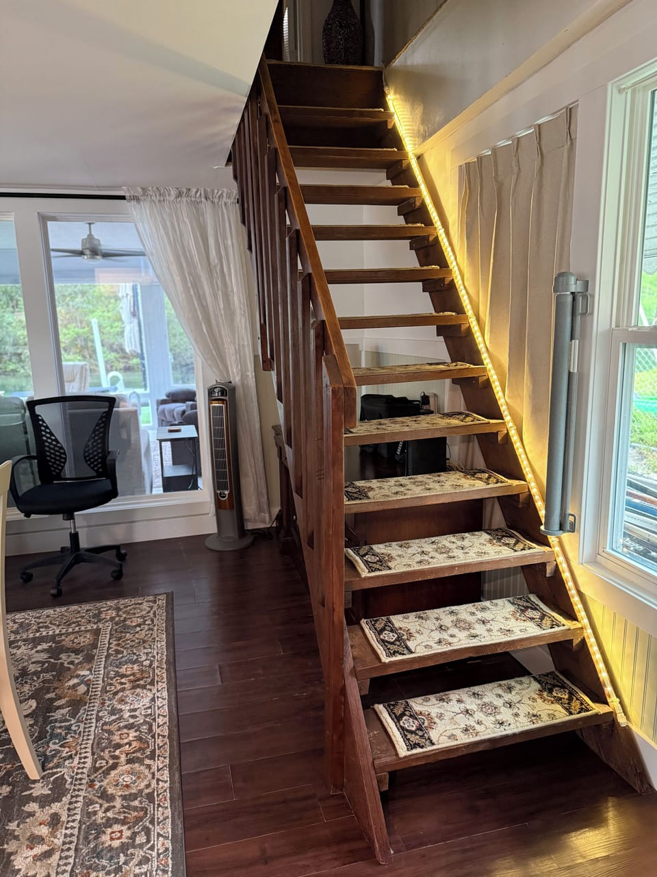 Game room with steep stairs leading to the  king bedroom & queen w/half bath