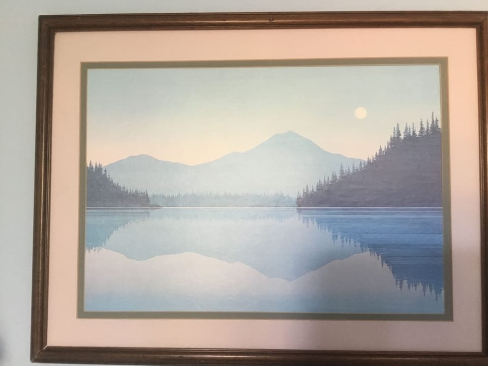 bedroom painting between beds