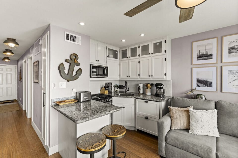 Fully equipped kitchen for family meals in your Galveston vacation rental