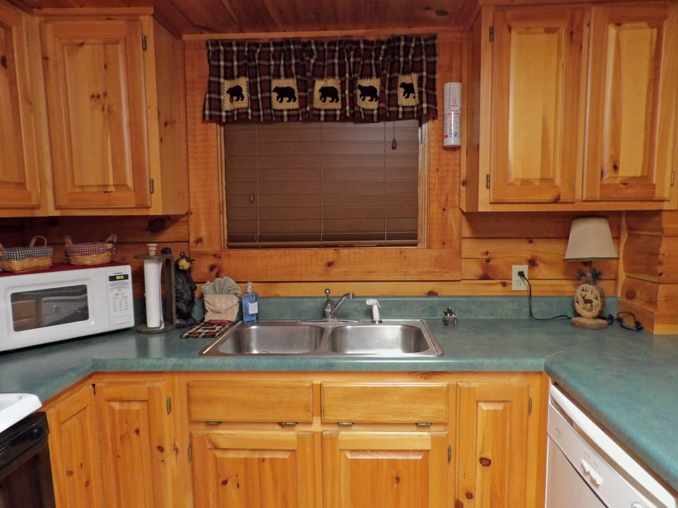 Full function kitchen with oven, stove, dishwasher, microwave and Kcup/auto drip