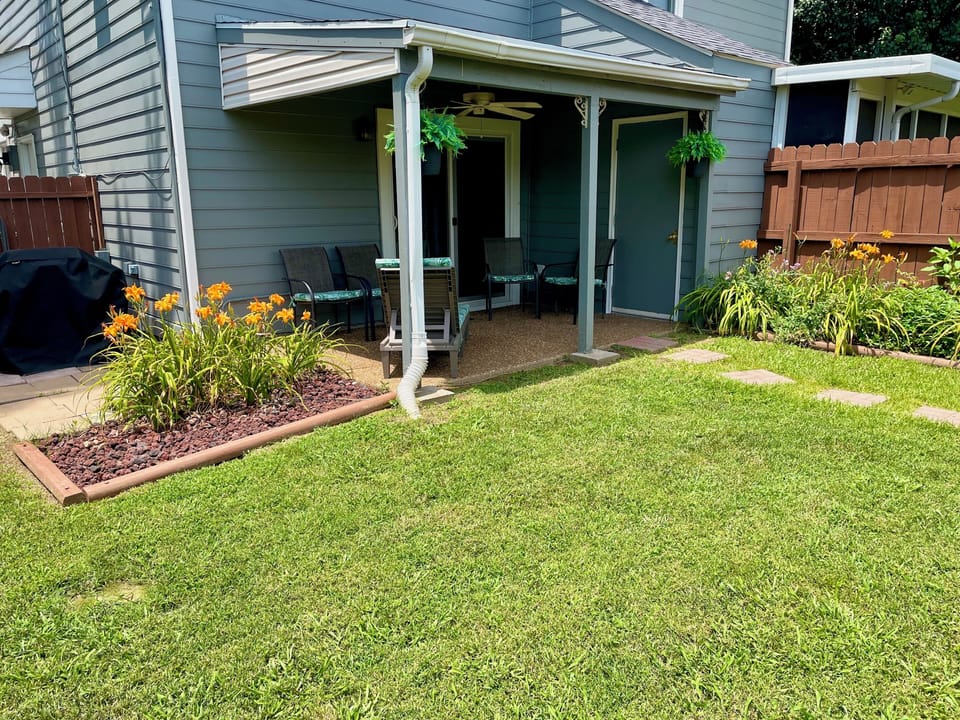 Back yard patio with grill.