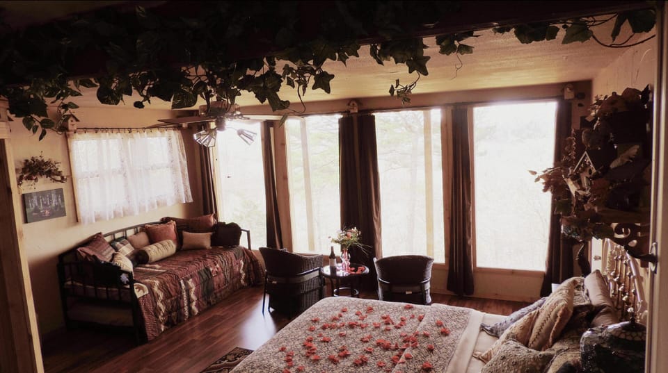 The Nest bedroom with awesome views of the Ozark Mountains