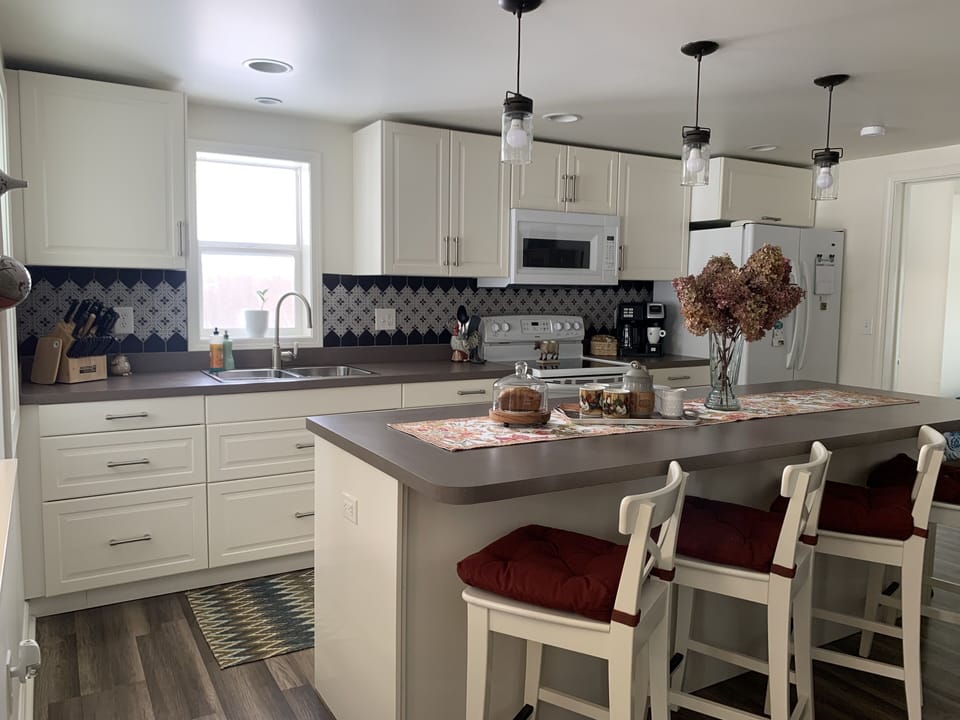 Enjoy our updated eat-in kitchen with everything you need to whip up a meal!
