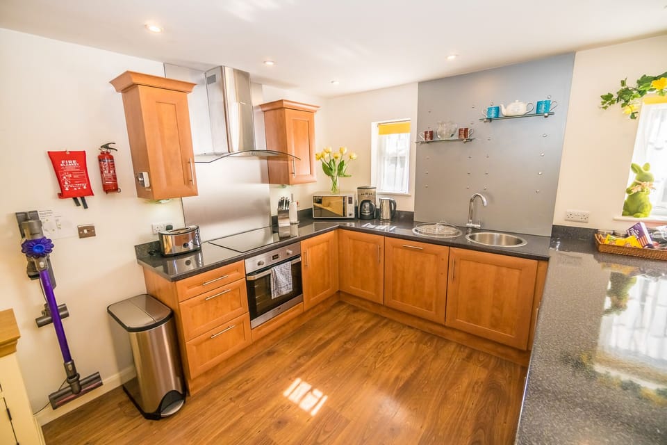 The large kitchen is fully equipped. Everything you need, just bring the food. 