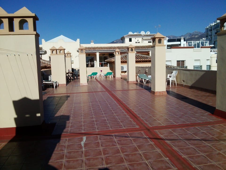Spacious sunny roof terrace