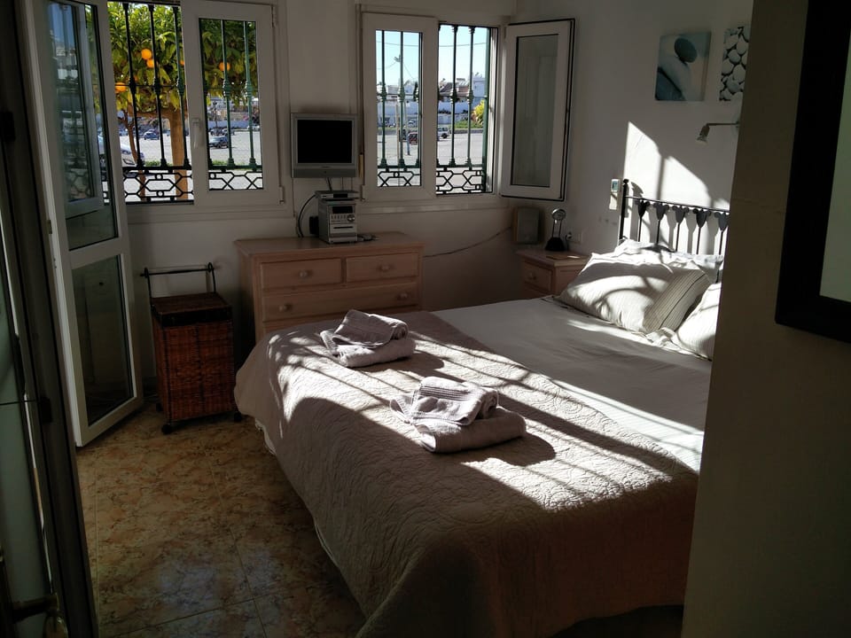Bedroom west facing with blackout shutters and security bars