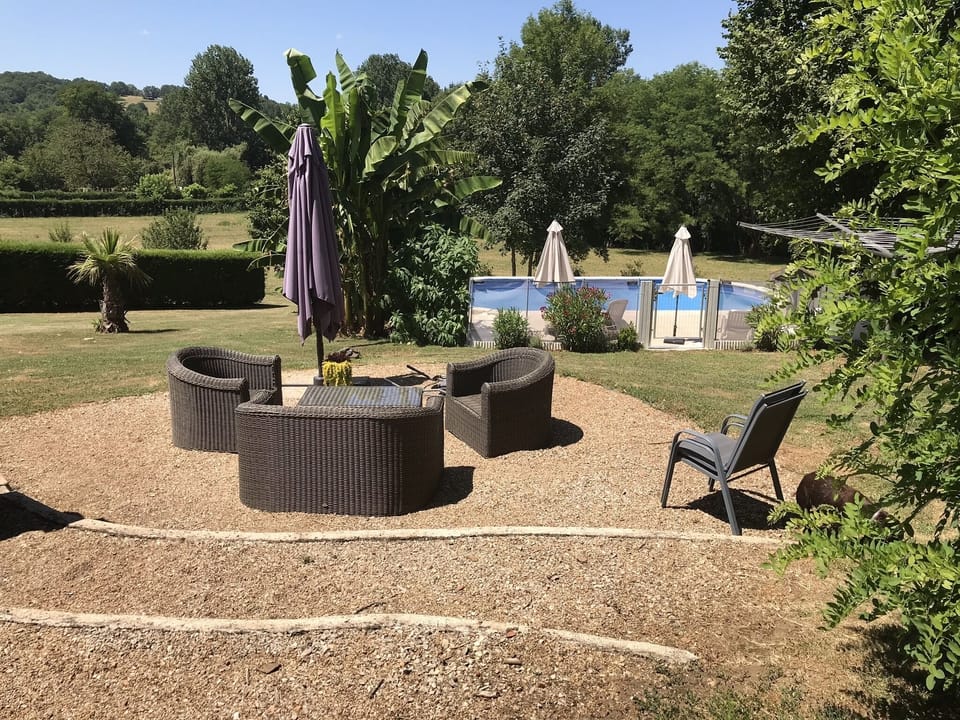 View of the pool, meadows and river beyond