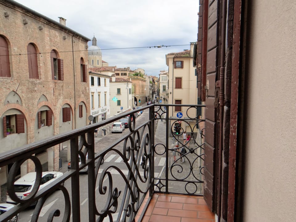 Small terrace with view of the medieval customs and cathedral. 