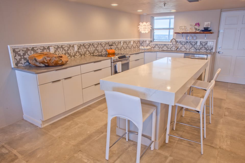 Encaustic tiles surround a luxe gourmet kitchen incl. a NINJA & electric juicer