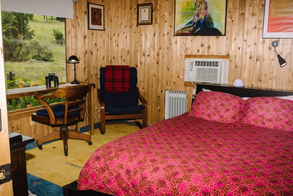 Pillowtop West Elm queen bed platform for two in the Writer's cabin.